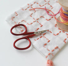 Load image into Gallery viewer, Tiny sharp embroidery scissors with red comfort handles made in Italy tiny and sharp Brooklyn Haberdashery