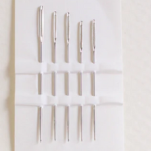 Load image into Gallery viewer, Embroidery Needle Pack Set Cohana Made in Hiroshima Japan  packaging by Hibara washi in Tokyo set of sharp needles for embroidery in beautiful package with soft blue background and imprinted white flowers Cohana japanese  character labels