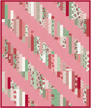 Load image into Gallery viewer, Luna Quilt pattern in Holly Jolly fabrics with pink background by Erica Jackman Kitchen Table Quilting Designs for quiltalong QAL SAL