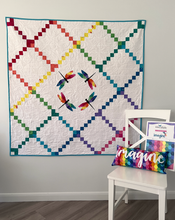 Load image into Gallery viewer, Dragonfly Flight Quilt Pattern by Kristy Lea aka Quiet Play modern Irish chain variation with a circle of geometric rainbow dragonflies in the center skill level intermediate
