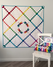 Load image into Gallery viewer, Dragonfly Flight Quilt Pattern by Kristy Lea aka Quiet Play modern Irish chain variation with a circle of geometric rainbow dragonflies in the center skill level intermediate