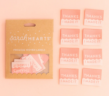 Load image into Gallery viewer, Woven centerfold label by Sara Hearts cream and coral pink half and half with Thanks I Made It in print cotton organic for clothing garments sewing projects purses bags gifts quilts