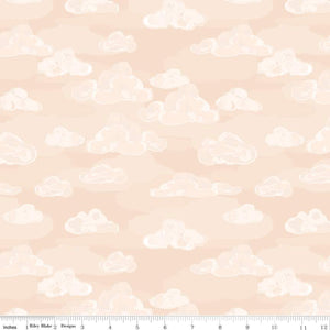 Wild and Free by Gracey Larson for Riley Blake Designs  quilt weight cotton fabric for quilting sewing garments bags soft peach background with low volume puffy clouds in watercolor style