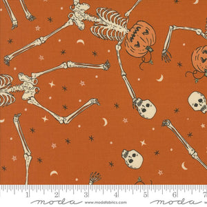 Home Sweet Haunt Stacy Hsu Moda Fabrics Halloween vintage style quilt cotton fabric bags garments rust background large skeletons with pumpkin heads jack o'lantern skulls fingernail moons and stars in cream and orange