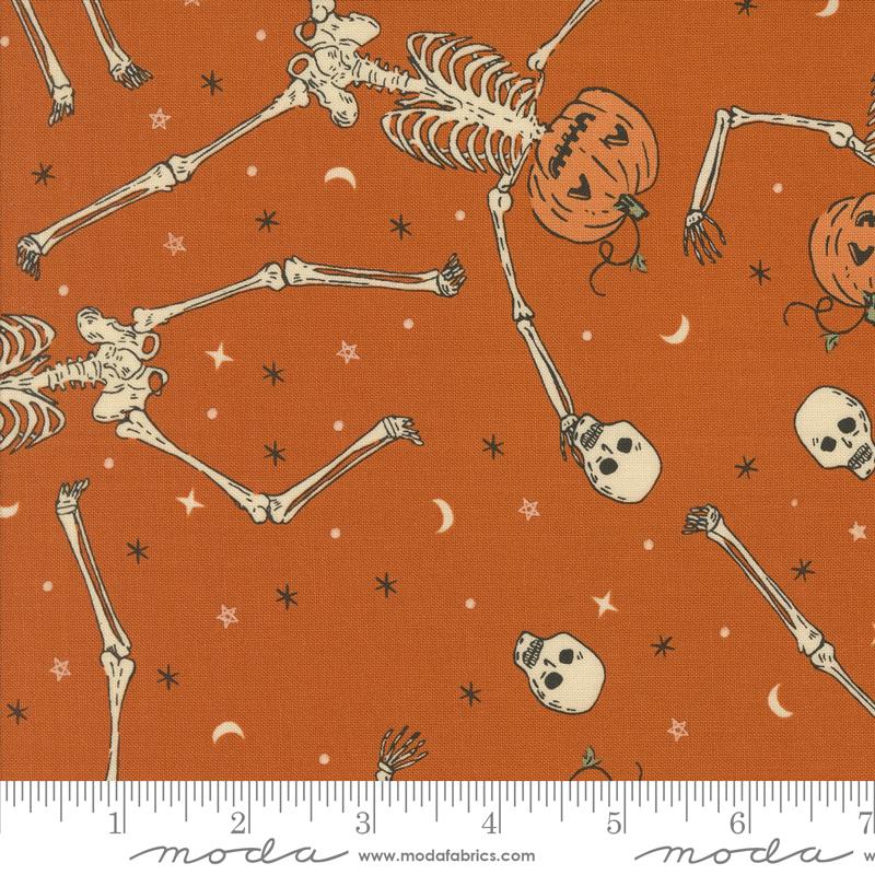 Home Sweet Haunt Stacy Hsu Moda Fabrics Halloween vintage style quilt cotton fabric bags garments rust background large skeletons with pumpkin heads jack o'lantern skulls fingernail moons and stars in cream and orange