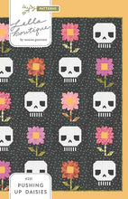 Load image into Gallery viewer, Pushing Up Daisies by Lella Boutique quilt pattern skeleton skulls daisy flowers traditional piecing templates halloween day of the dead
