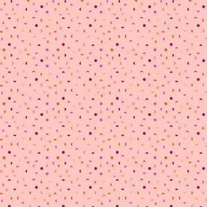 Mythical It's a Phase by Stacy Peterson Freespirit Fabrics cotton quilting fabric blush pink background tiny scattered moons in different phases fingernail half and full 