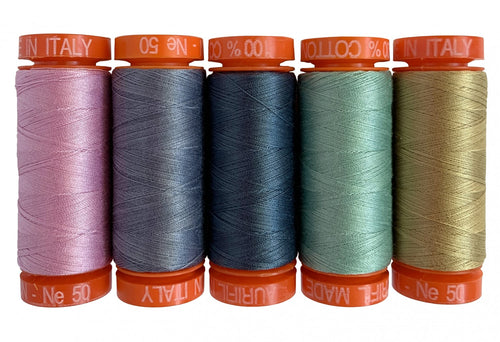 Aurifil 50 weight thread collection curated by Anna Maria Horner to coordinate with her Vivacious lawn collection soft pink, gray slate blue green and fold small spools in decorated box