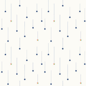 Starfall in Off White  from the Imagine collection by Quiet Play Kristy Lea for Riley Blakes Designs rainbow and navy falling stars hanging by a thread on off white background high quality material for quilts garments bags and other sewing projects