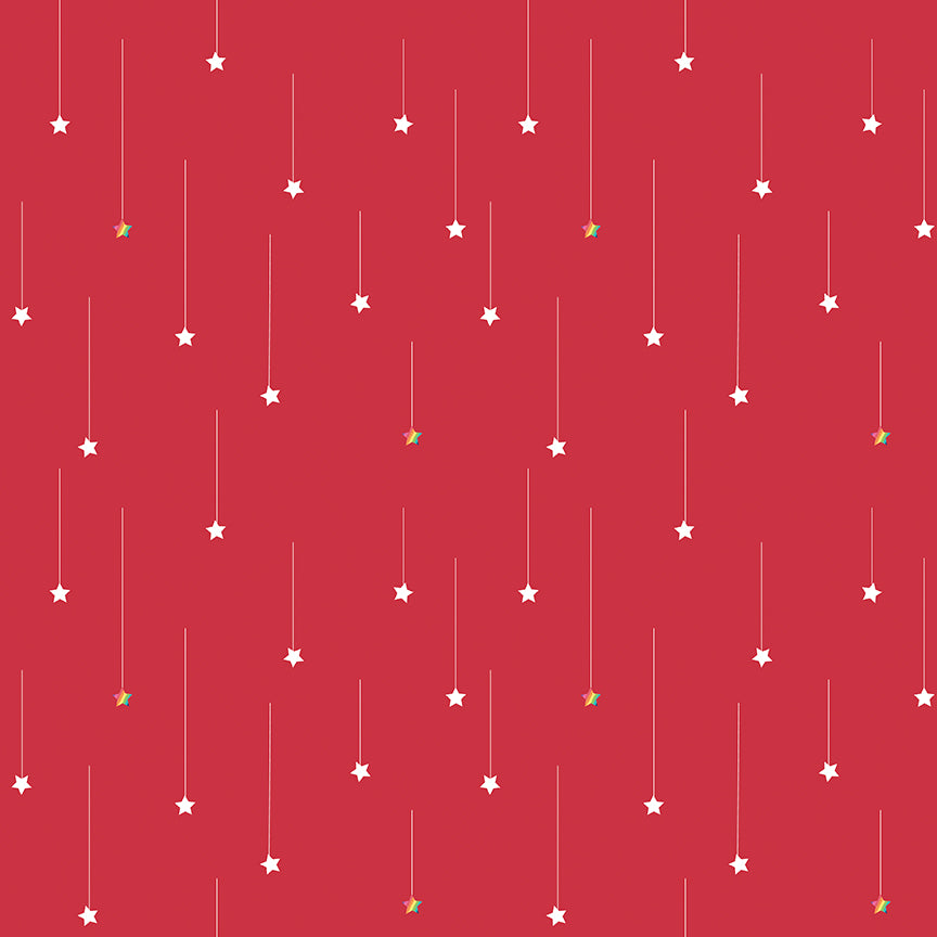 Red Starfall Fabric from Imagine by Quiet Play Kristy Lea for Riley Blake Designs rainbow and white falling stars hang from a thread on a red background high quality quilting sewing material fabric for quilting garments bags and other projects 