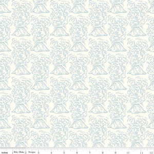 Low volume tone on tone volcanoes from the Roar collection by Citrus and Mint for Riley Blake Designs cream background with outlined erupting volcanoes in slate blue gray high quality quilting weight fabric for quilts bags sewing projects clothing garments