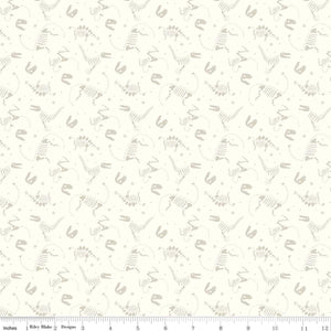 Roar Bones from the Roar collection by Citrus and Mint for Riley Blake Designs cream background with outlined  dinosaur bones skeletons in tanhigh quality quilting weight fabric for quilts bags sewing projects clothing garments