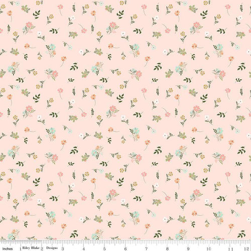 Wild and Free by Gracey Larson for Riley Blake Designs  quilt weight cotton fabric for quilting sewing garments bags soft blush pink background with tossed small pink and peach flowers and soft green leaves