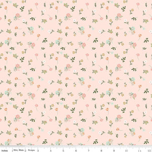Wild and Free by Gracey Larson for Riley Blake Designs  quilt weight cotton fabric for quilting sewing garments bags soft blush pink background with tossed small pink and peach flowers and soft green leaves