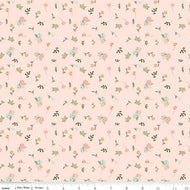 Wild and Free by Gracey Larson for Riley Blake Designs  quilt weight cotton fabric for quilting sewing garments bags soft blush pink background with tossed small pink and peach flowers and soft green leaves