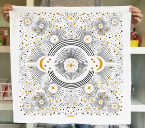 Constellation flour sack tea towel with hanging loop by Gingiber designs gold fingernail moons stars and radiating light lines with stars and constellations