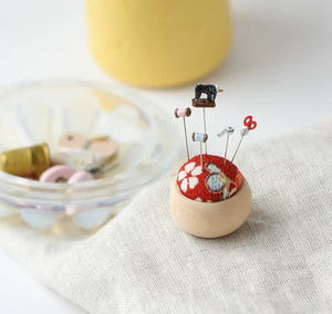 Sew Tiny Pincushion by Hiro Made in Kyoto Japan red floral print fabric hand turned cypress base miniature pins glass sewing machine scissor spools tape measure high quality 