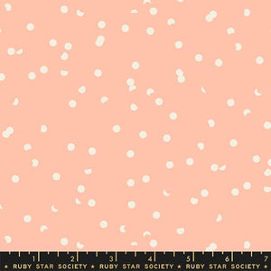 Hole Punch Dot by Kimberly Kight for Moda Fabrics light peach background with cream tossed circles and fingernail moon shapes cotton quilt weight fabric material
