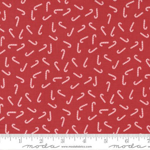 Holly Jolly Christmas by Urban Chiks for Moda Fabrics scattered candy canes on berry red background with scattered sprigs of holly berries high quailty cotton for quilts aprons pillowcase reusable gift bags tree skirt material