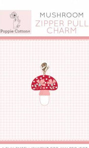 Poppie Cottons Mushroom zipper pull charm red enamel mushroom cap with painted flowers and pink and white stem lobster claw to attach to zipper bags backpack