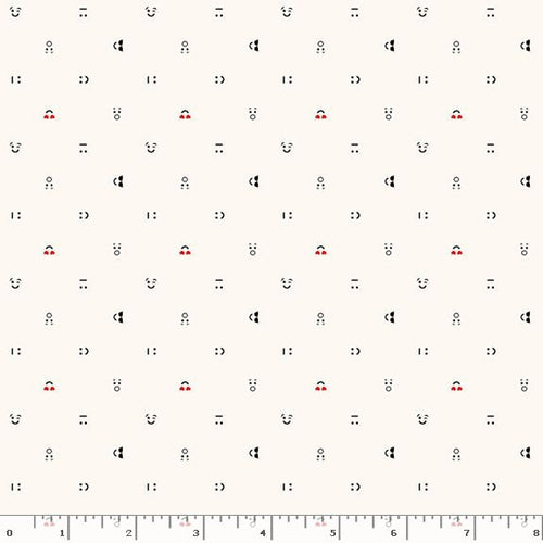 Tiny faces with smiles and surprise on an off white back ground. 