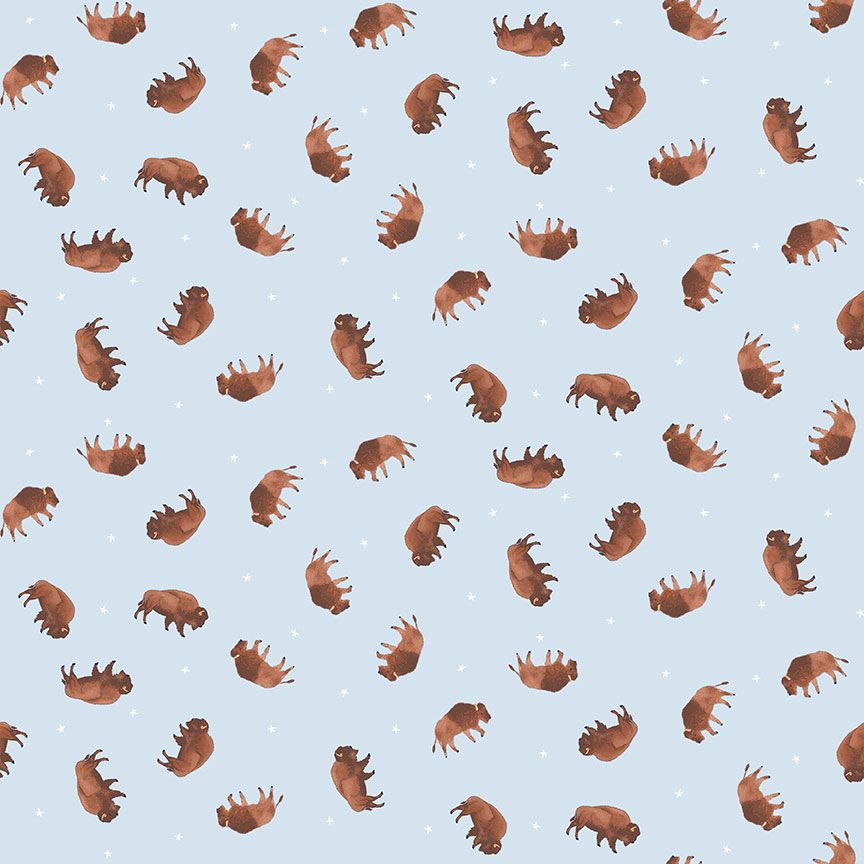 Dear Stella Be Brave tossed buffalo prints with small scattered buffaloes and tiny white stars native american wild west on soft blue background cotton quilt weight fabric for quilts garments bags sewing projects