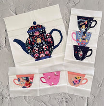 Load image into Gallery viewer, Quiet Play Tea Party Table Runner Down the Rabbit Hole fabric by Jill Howarth Teapot teacups and stacks of cups with Alice in Wonderland scenes in navy pink and peach on a solid white background includes pattern backing binding cotton quilt fabric
