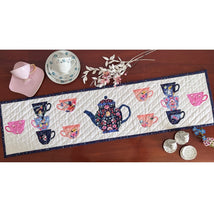 Load image into Gallery viewer, Quiet Play Tea Party table runner kit using Down the Rabbit Hole fabric by Jill Howarth for Riley Blake Designs Alice in Wonderland theme teapot teacups 

