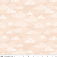 Wild and Free by Gracey Larson for Riley Blake Designs  quilt weight cotton fabric for quilting sewing garments bags soft peach background with low volume puffy clouds in watercolor style