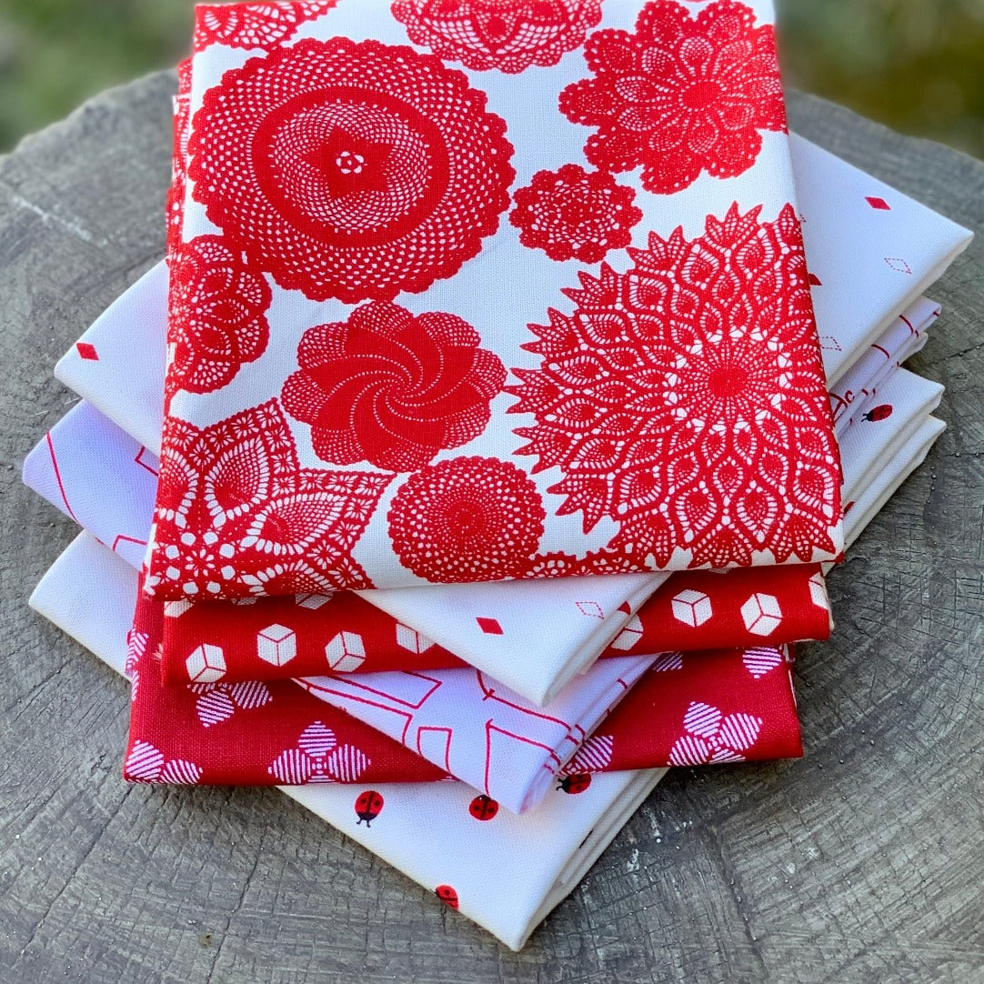 Red Hot collection fat quarter bundle Beverly McCullough Citrus and Mint Christopher Thompson Tattoed Quilter Lace doilies boxes ladybugs patterns diamonds mod flowers petals riley blake designs quilting sewing cotton material