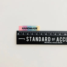 Load image into Gallery viewer, Handmade Rainbow woven labels are 4.5cm long.
